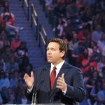 Protestor Storms Stage During DeSantis Town Hall