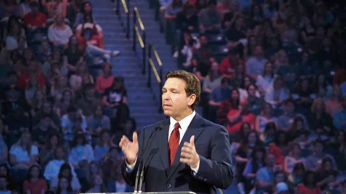 Protestor Storms Stage During DeSantis Town Hall